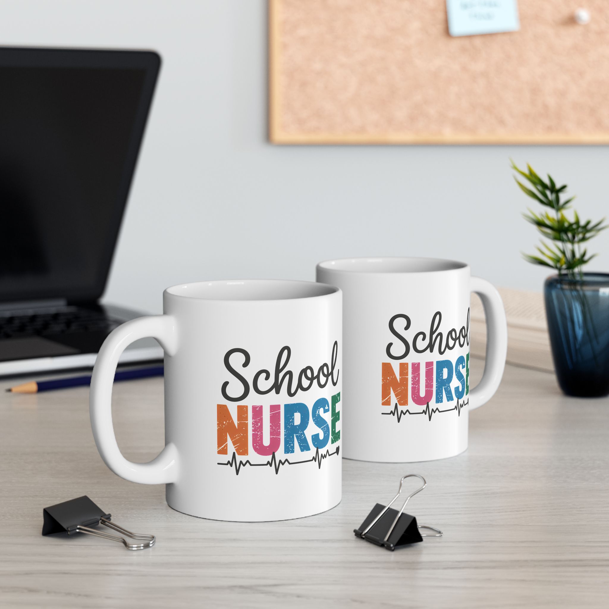 White ceramic mug with "School Nurse" in colorful distressed letters and a heartbeat line.