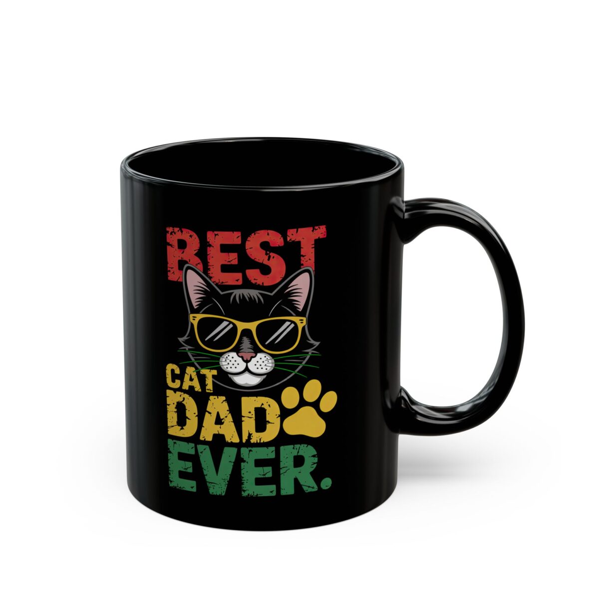 A black mug with the text "BEST CAT DAD EVER" printed on it, along with a graphic of a cat wearing sunglasses and a paw print.
