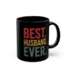 Black mug with distressed text reading 'BEST. HUSBAND. EVER.' in red, yellow, and green.