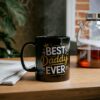A black mug with the text 