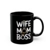 Black ceramic mug with white text 