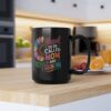 Black mug with a colorful sunflower and text that says 