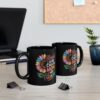Black ceramic mug with a colorful sunflower design and text that reads 