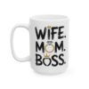 White ceramic mug with black text that reads