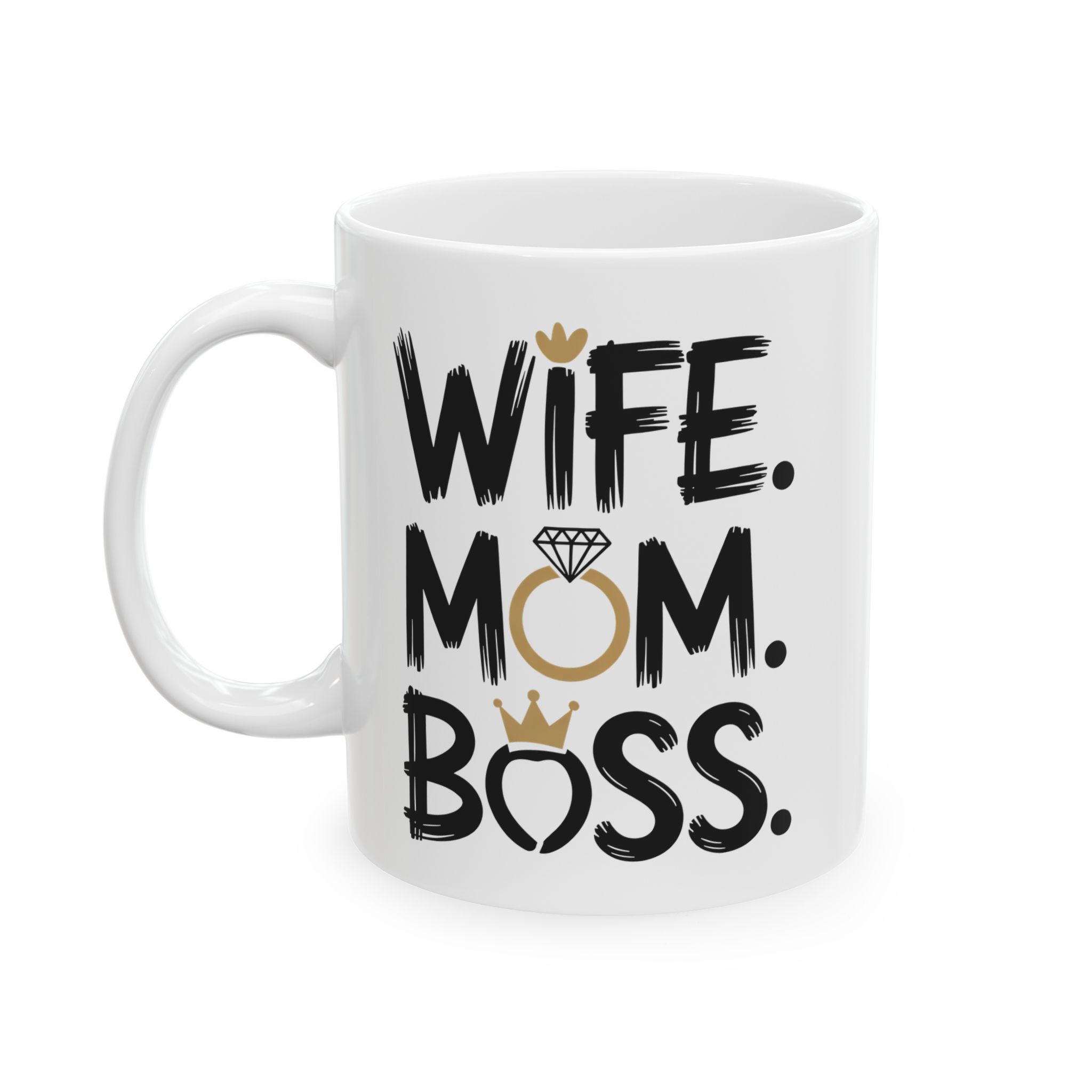 White ceramic mug with black text that reads "WIFE. MOM. BOSS." adorned with gold crowns and a ring.