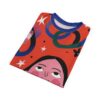 Red-orange all-over-print t-shirt, abstract stylized faces, blue, green graphic shapes, white stars, black butterflies, seamless sublimation print.