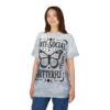 Faded blue and grey clouds cover this sublimation graphic tee, featuring a large black butterfly with ornate wings and the words