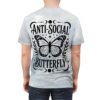 White and light blue marble patterns cover this patterned tee shirt, with a black graphic of a butterfly and the words