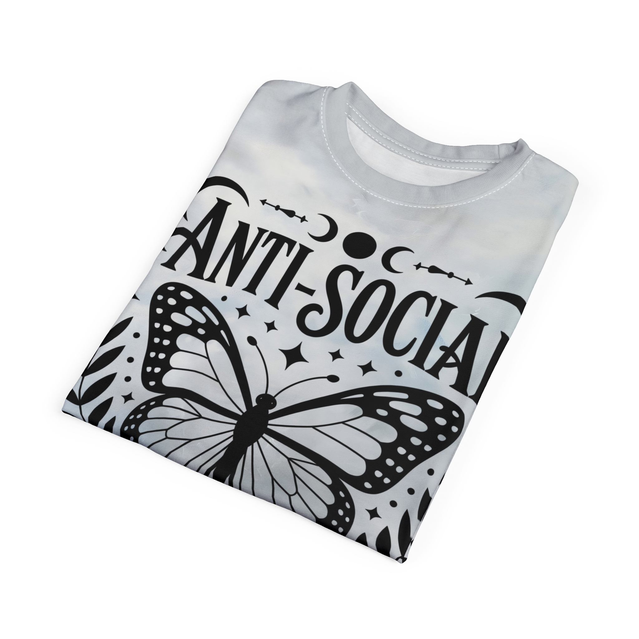 Black and white patterns including a monarch butterfly, stars, moons, and leaves cover this all over print t-shirt, with text reading "ANTI-SOCIAL".