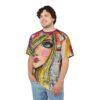 Abstract collage portrait, bold blue eye, pink lips, blonde hair, text background, vibrant colors, all over print, sublimation tee.