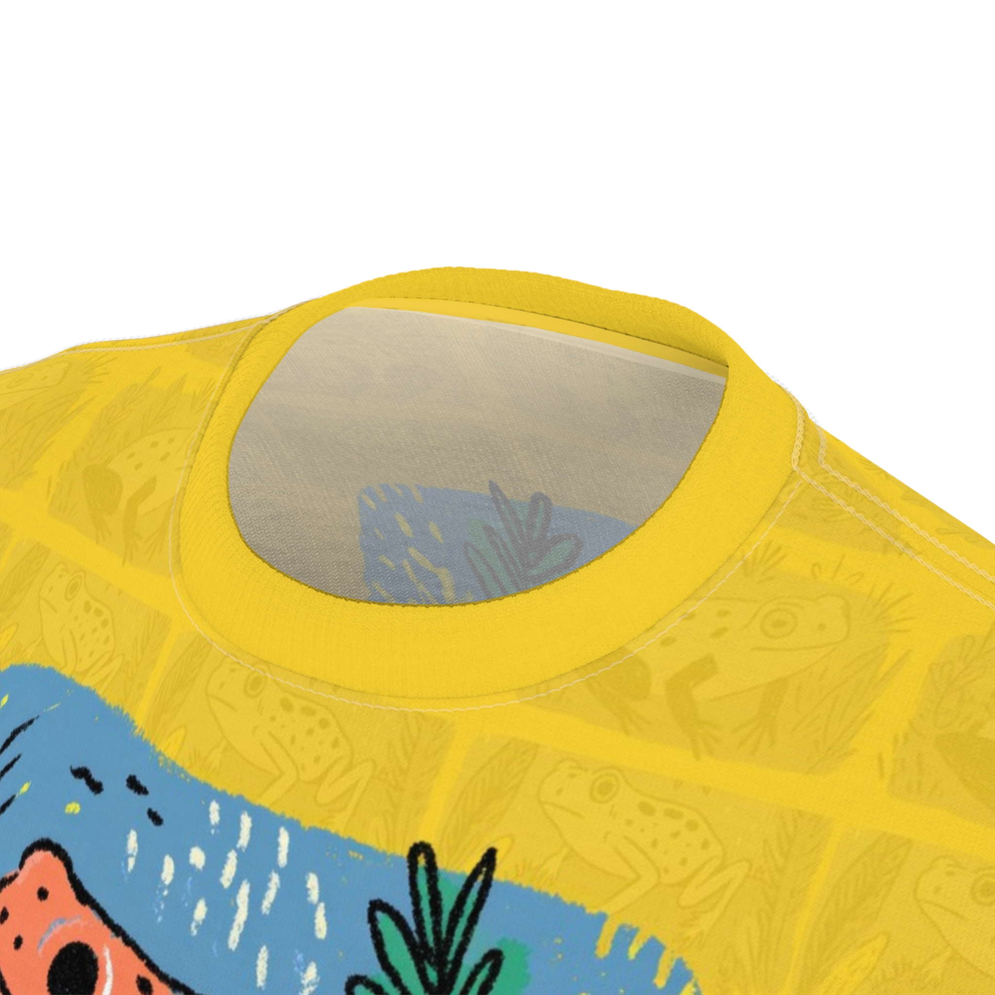 Yellow with light yellow frogs and grass patterns cover this seamless pattern tee, featuring a vibrant blue stripe with white speckles and green foliage.