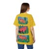 Yellow with a subtle grid pattern and repeating frog motifs cover this graphic t-shirt, featuring three illustrated frogs in different panels.