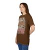 Beige, peach, and pink lettering with floral accents and a coffee cup adorn this brown graphic tee.