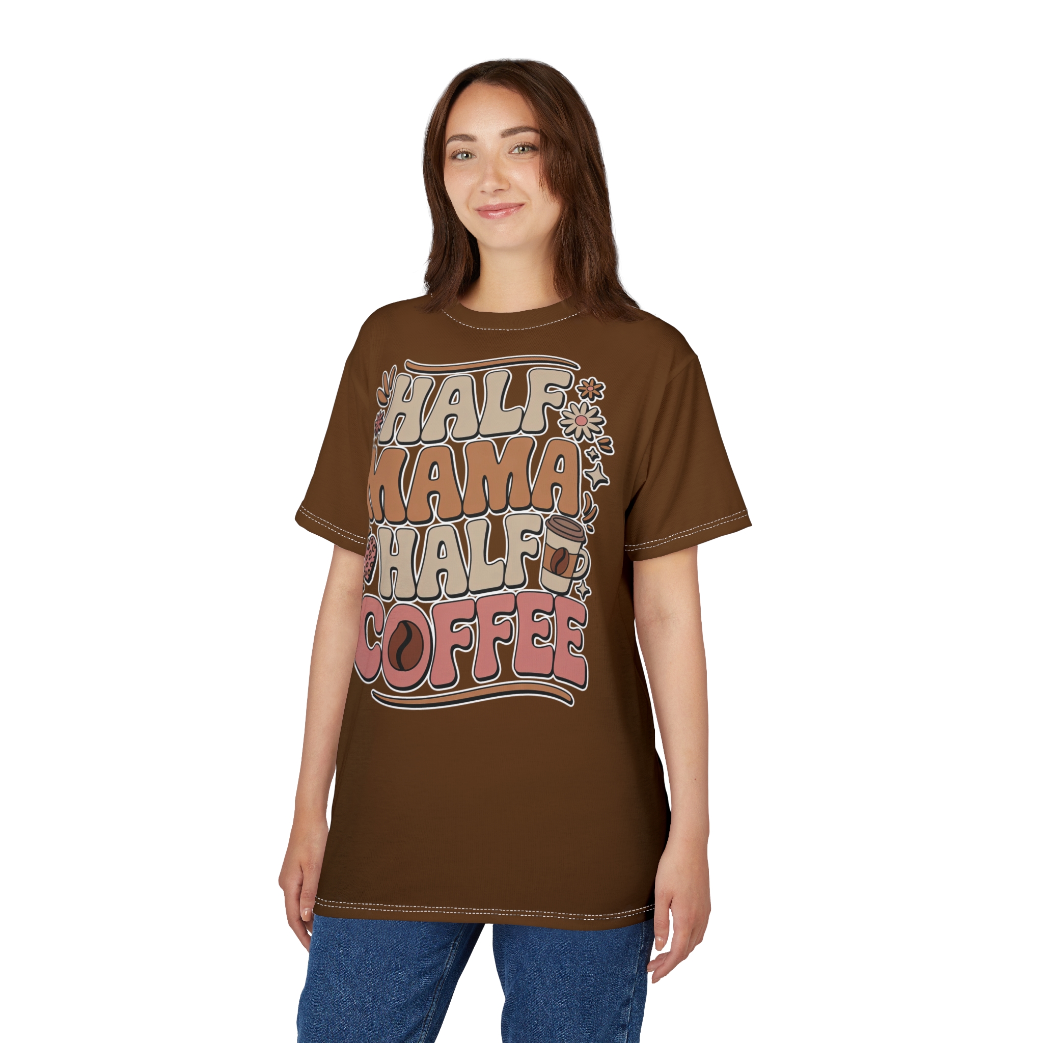 Cream, brown, pink, and tan lettering with floral accents and coffee cup graphics cover this graphic streetwear tee, reading "HALF MAMA HALF COFFEE".