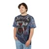 Blue, grey, and red tones cover this graphic streetwear tee, with a fierce panther head, fangs, and bloody splatters.