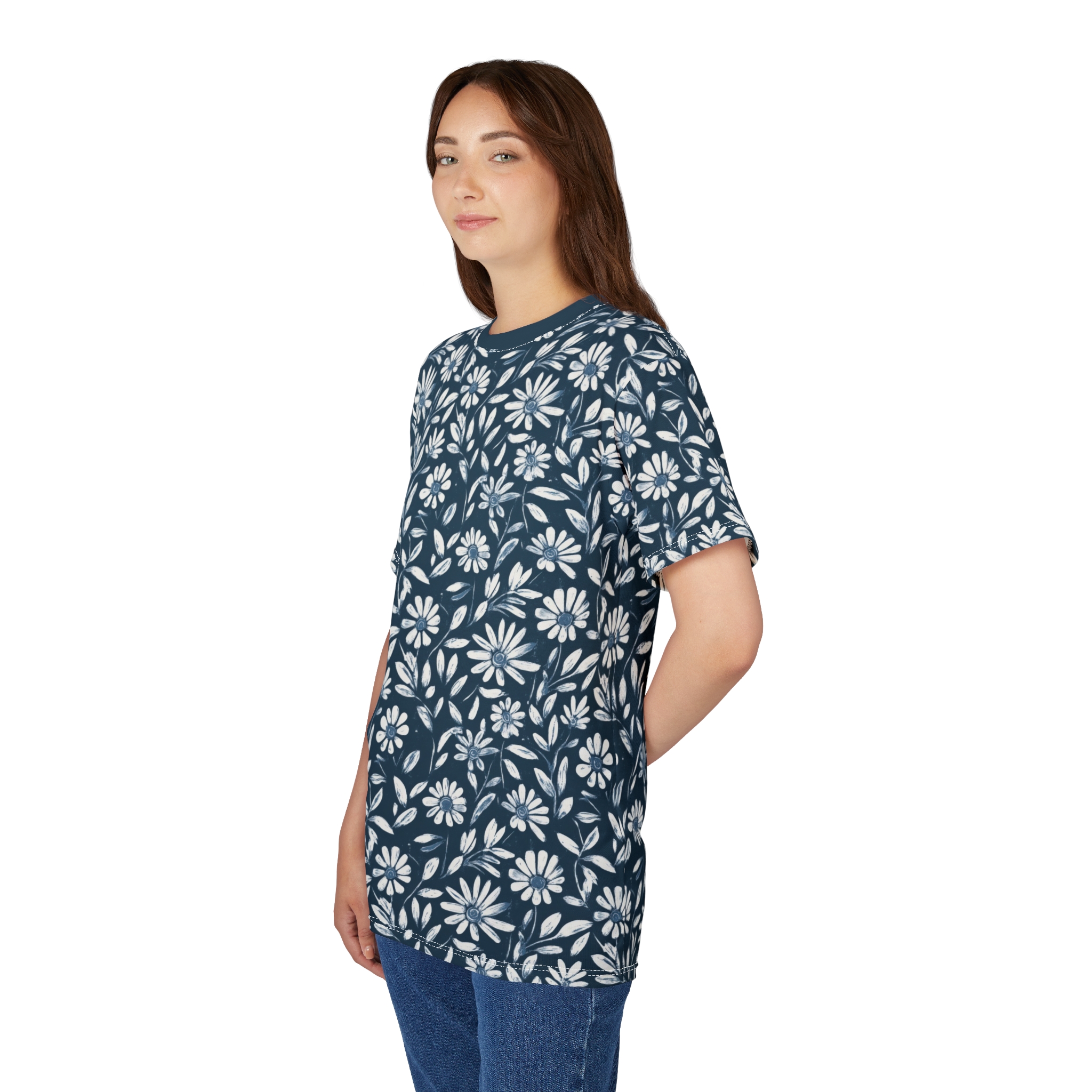 White daisies and leaves on a dark blue background cover this full print shirt, creating a botanical pattern.