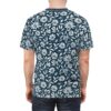 White and blue daisy flowers and leaves cover this full print shirt, set against a dark navy background.