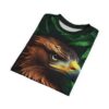 Brown feathers, vibrant green foliage cover this sublimation graphic tee, depicting a closeup golden eagle.