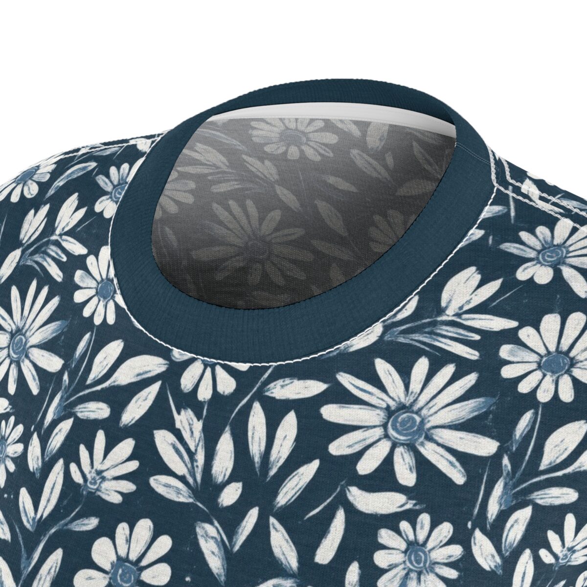 Navy blue all over print sublimation tee featuring a vintage white floral pattern and scattered leaves.