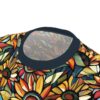 All over print sublimation tee, vibrant stained glass sunflower seamless pattern, yellow, orange, red, green, blue geometric shapes, dark blue neckline.