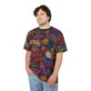 Vibrant graffiti art with peace signs, flowers, and text like 'Love' and 'Peace' covers this sublimation graphic tee.