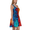 Tribal flame sublimation tee dress with a vibrant blue, red, and orange wrap around graphic.