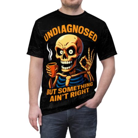 Black all over print, grunge texture, skeleton graphic, coffee cup, 'OK' gesture, orange 'UNDIAGNOSED BUT SOMETHING AIN'T RIGHT'.