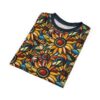 Yellow, orange, red, and blue geometric shapes form sunflowers and leaves, creating a vibrant mosaic pattern across this apparel.