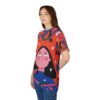 Red sublimation tee displays whimsical streetwear aesthetic all over print, seamless wrap around graphic illustration.