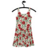 Cream all over print sublimation dress featuring vibrant red roses and green leaves. Vintage pattern design with seamless wrap around graphic.