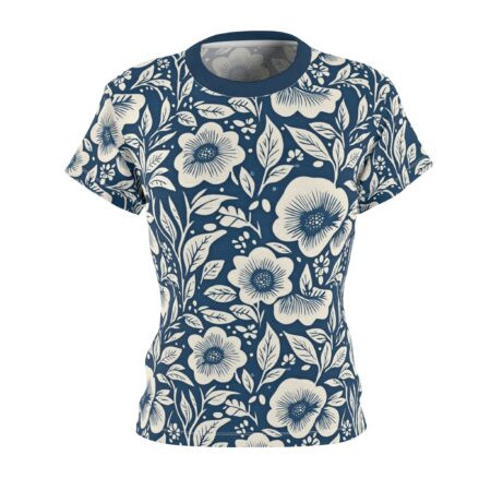 All over print sublimation tee featuring a vintage pattern of large cream-colored flowers and leaves on a deep blue background.
