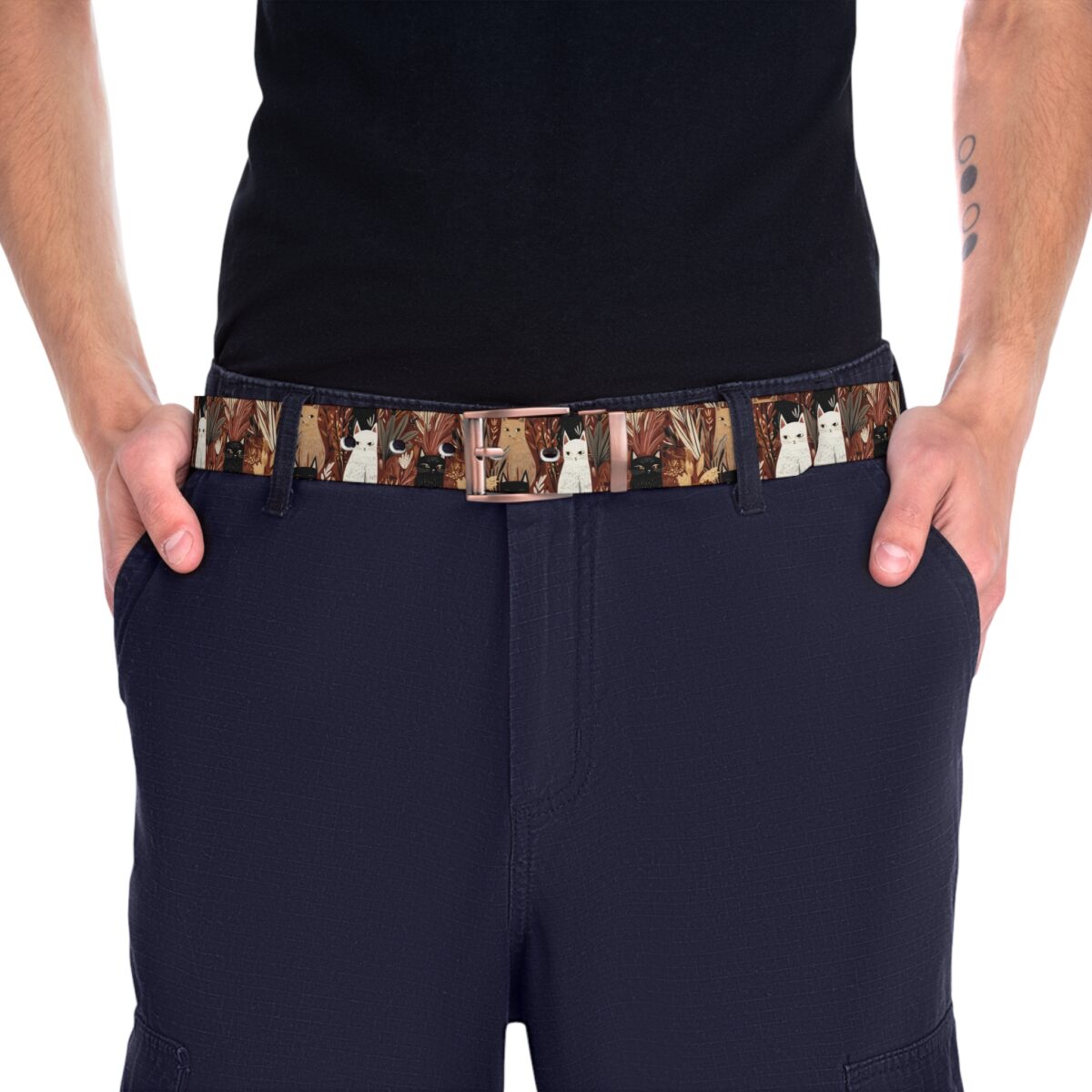 All over print belt with a repeating pattern of stylized cats and foliage. Features white, black, and tan cats in a cohesive design.