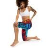 Vibrantly colored leggings featuring an abstract wave pattern in shades of red, orange, blue, and teal on a dark background.