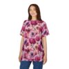 Pink, purple, and crimson floral patterns cover this oversized full print tee, featuring blooming poppies and anemones with dark centers.