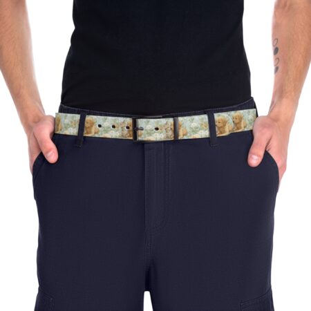 Golden retriever puppies and tabby kitten wear a floral print belt with daisies and forget-me-nots.