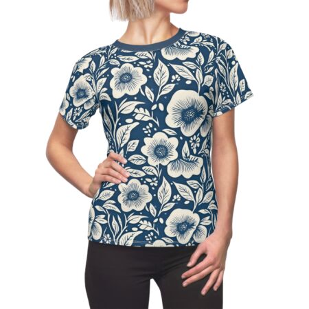 Navy sublimation tee with a seamless cream floral pattern and leaf accents.