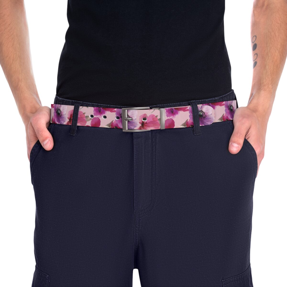 Pink belt with a seamless all over print of vibrant purple and pink floral designs.
