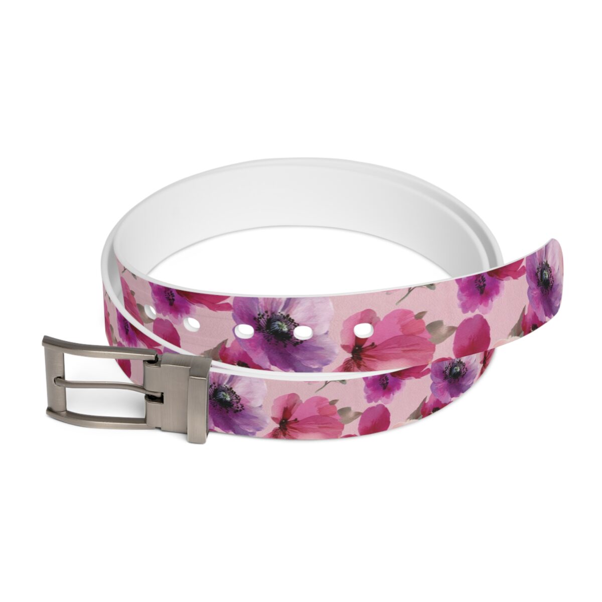 Pink belt with a repeating watercolor floral print of pink and purple poppies, featuring a silver buckle.