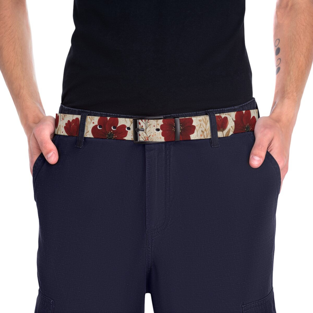 Canvas belt with a vintage botanical design featuring large red floral poppies and delicate leaves on a textured cream background.