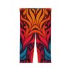Flowing red, orange, and blue flame-like shapes create a dynamic all over print apparel design with a dark background.