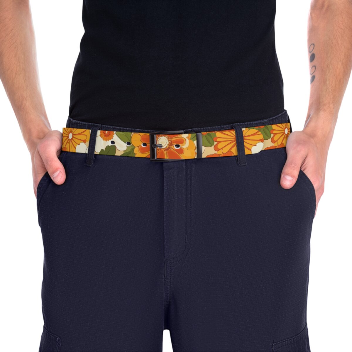 Retro floral belt with vintage flower pattern in orange, yellow, and green. Features a black buckle.