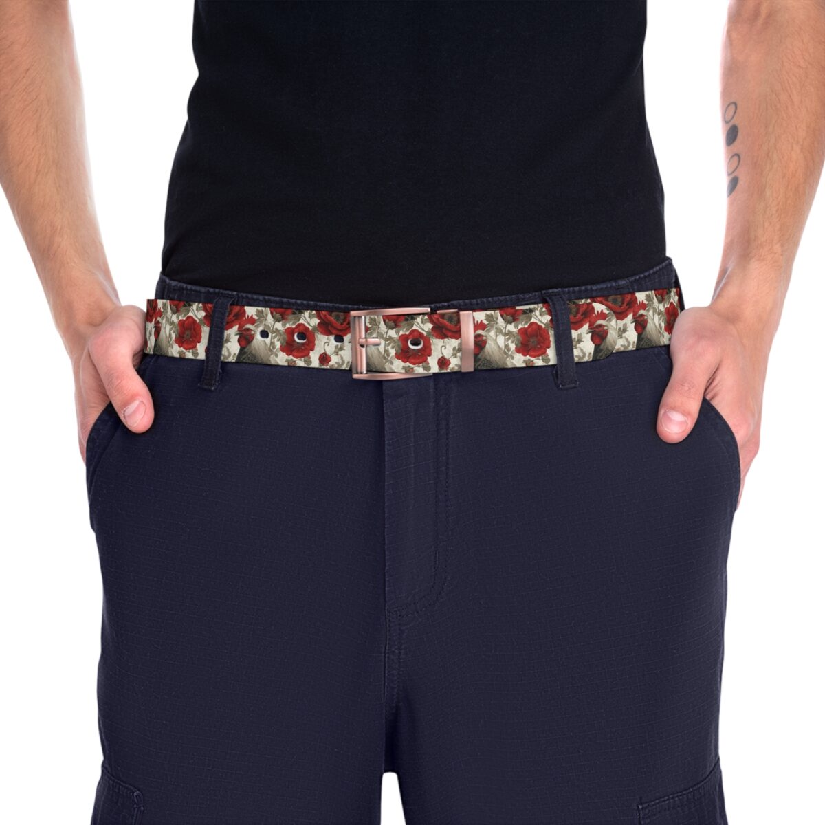Men's belt with a repeating pattern of red poppies and roosters, featuring a vintage aesthetic.