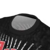 Black, white, and red graphic elements cover this seamless pattern tee with a distressed, textured vibe.