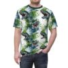 Green watercolor dinosaurs with open mouths and sharp teeth cover this all over print t-shirt with a splashy, dynamic vibe.