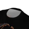 Fiery orange and black dragon scales and gothic skulls cover this seamless pattern tee with a dark, intense vibe.