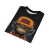 Orange cap, red logo, and an angry monkey with blue eyes cover this 3D graphic t-shirt from the neck down.