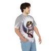 Grey and white abstract patterns cover this patterned tee shirt, featuring a cherubic figure with wings aiming a handgun.