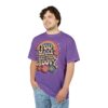 A rainbow, smiley-face flowers, and stars cover this purple tee shirt with the words