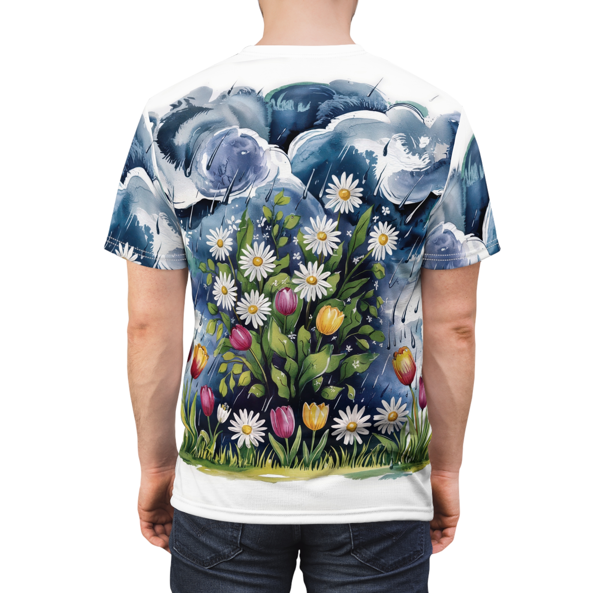 Moody blue watercolor clouds with rain drops and a vibrant bouquet of daisies and tulips on this all over print tee.