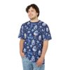 Blue and white floral patterns and Easter eggs cover this graphic streetwear tee, set against a deep blue background.